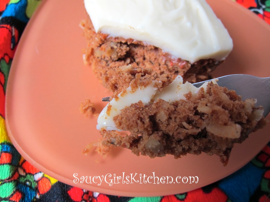 Taking a bite of Carrot Cake with Cream Cheese Frosting