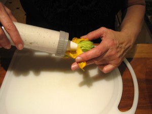 stuffing the zucchini blossom