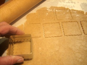 Cutting the cookies out of rolled dough
