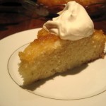 Piece of Cardamom Pear Cake with fresh Whipped Cream