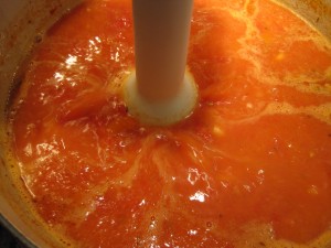 blending tomato soup with emulsion blender