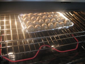 Meatballs cooking in the oven