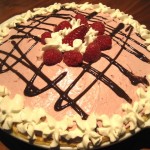 Raspberry Cream Pie with Chocolate Ganache and Whipped Cream