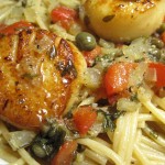 Scallop on pasta close up