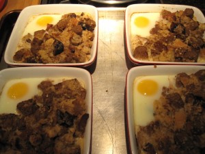 French Toast Bread Puddings on baking sheet in the oven