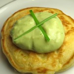 Corn Cake with Avocado Cilantro Sauce on top