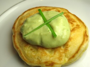 Corn Cake with Avocado Cilantro Sauce on top