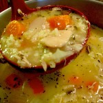 Ladle full of Homemade Chicken Soup with Rice