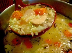 Ladle full of Homemade Chicken Soup with Rice