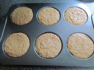 Muffin mix in the muffin top pan