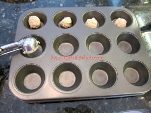 placing pastry dough in mini muffin tin