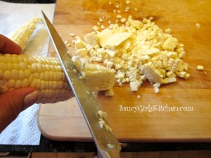 Cutting corn off the cob